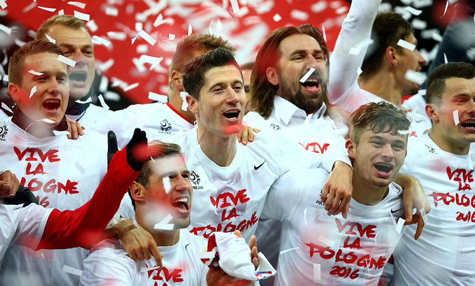 Robert Lewandowski celebrates with Poland