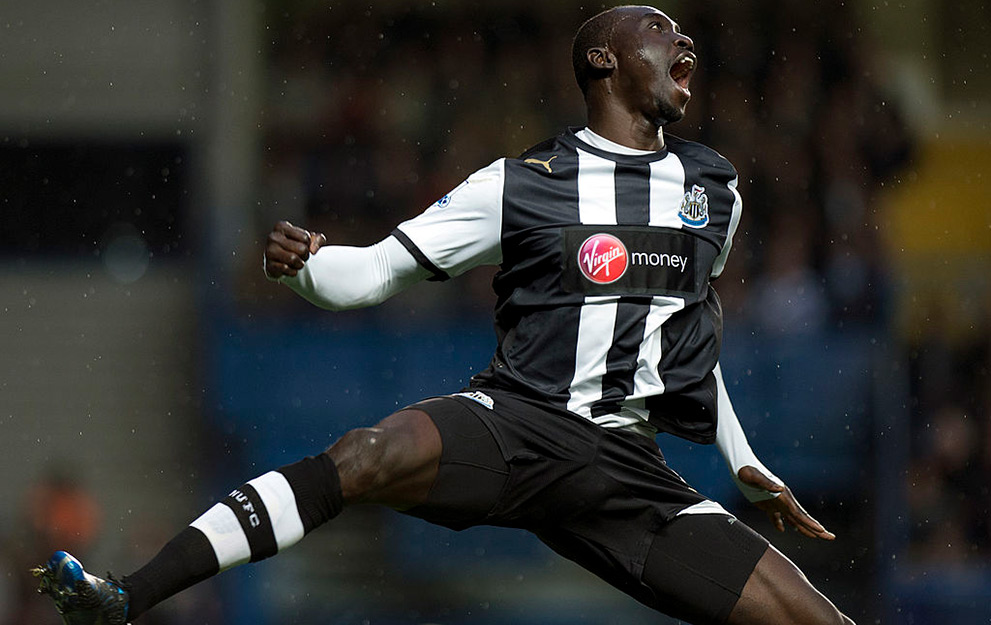 Newcastle United's Papiss Cisse celebrates after scoring the opening goal against Chelsea during the English Premier League football match at Stamford Bridge in London