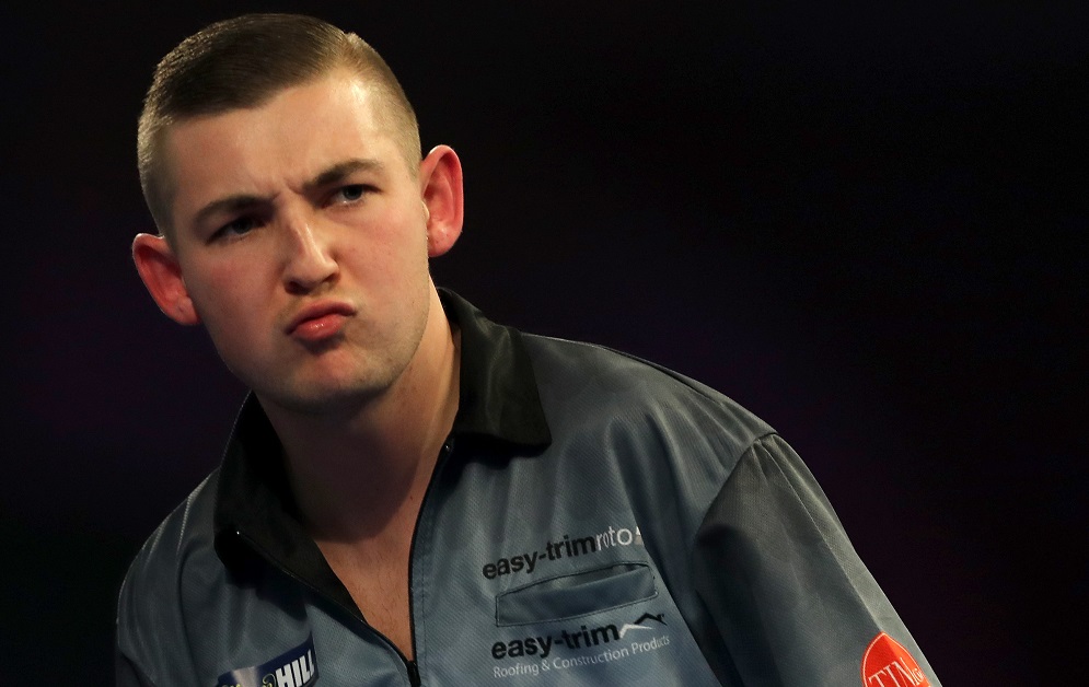 LONDON, ENGLAND - DECEMBER 30: Nathan Aspinall of England reacts during the 2019 William Hill World Darts Championship Semi-Final match between Nathan Aspinall and Michael Smith at Alexandra Palace on December 30, 2018 in London, United Kingdom. (Photo by James Chance/Getty Images)