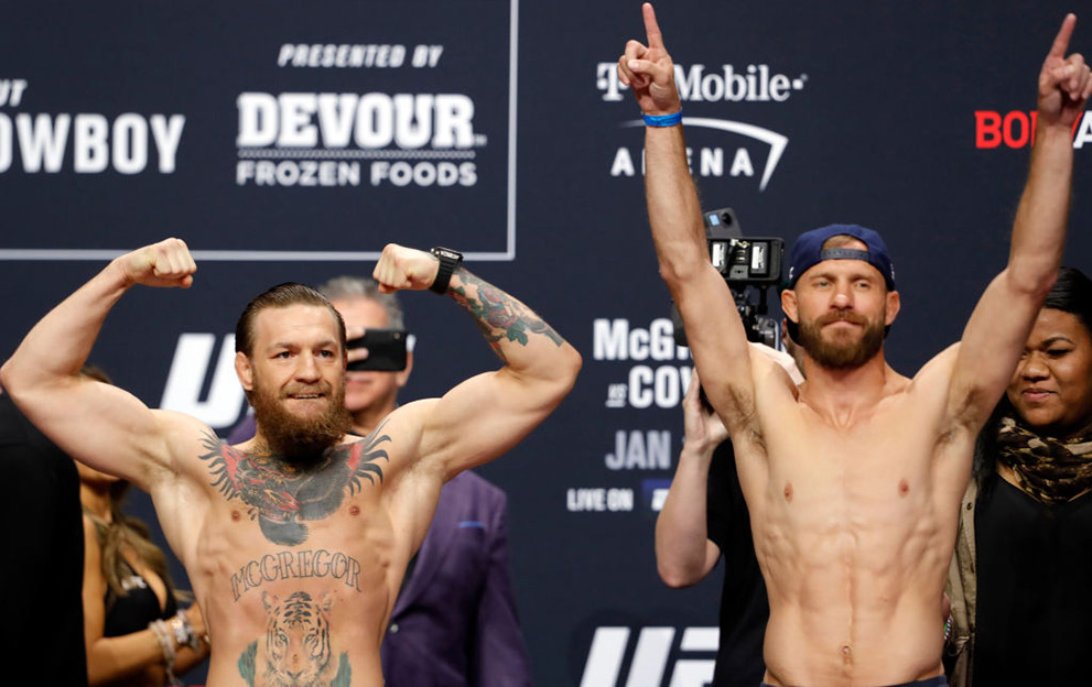 LAS VEGAS, NEVADA - JANUARY 17: Welterweight fighters Conor McGregor (L) and Donald Cerrone pose during a ceremonial weigh-in for UFC 246 at Park Theater at Park MGM on January 17, 2020 in Las Vegas, Nevada. (Photo by Steve Marcus/Getty Images)