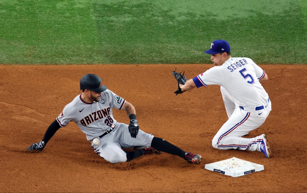 Tommy Pham of the Arizona Diamondbacks & Corey Seager of the Texas Rangers, october 2023