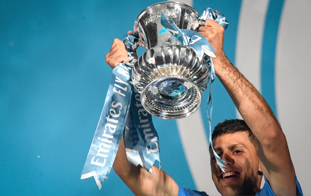 Rodri lifts the FA Cup trophy