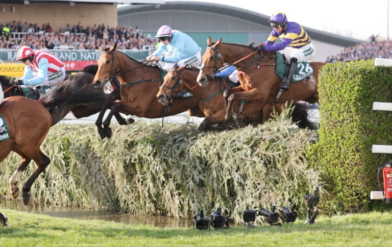 Corach Rambler jumping a fence in the Aintree Grand National