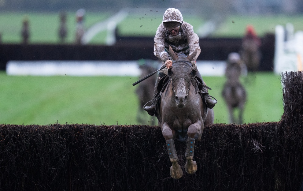 Nassalam jumping a fence in the Welsh Grand National at Chepstow