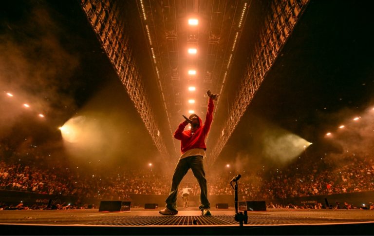 Kendrick Lamar performing on stage