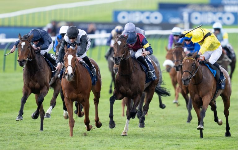 Elmalka wins the 1000 Guineas at Newmarket