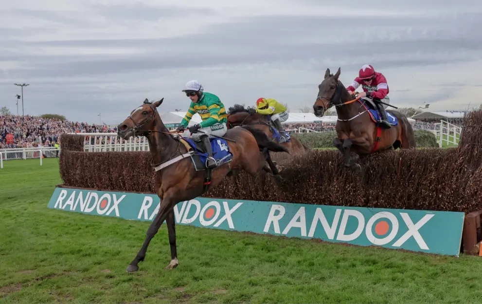 Jonbon jumping a fence at Aintree en route to winning the Melling Chase