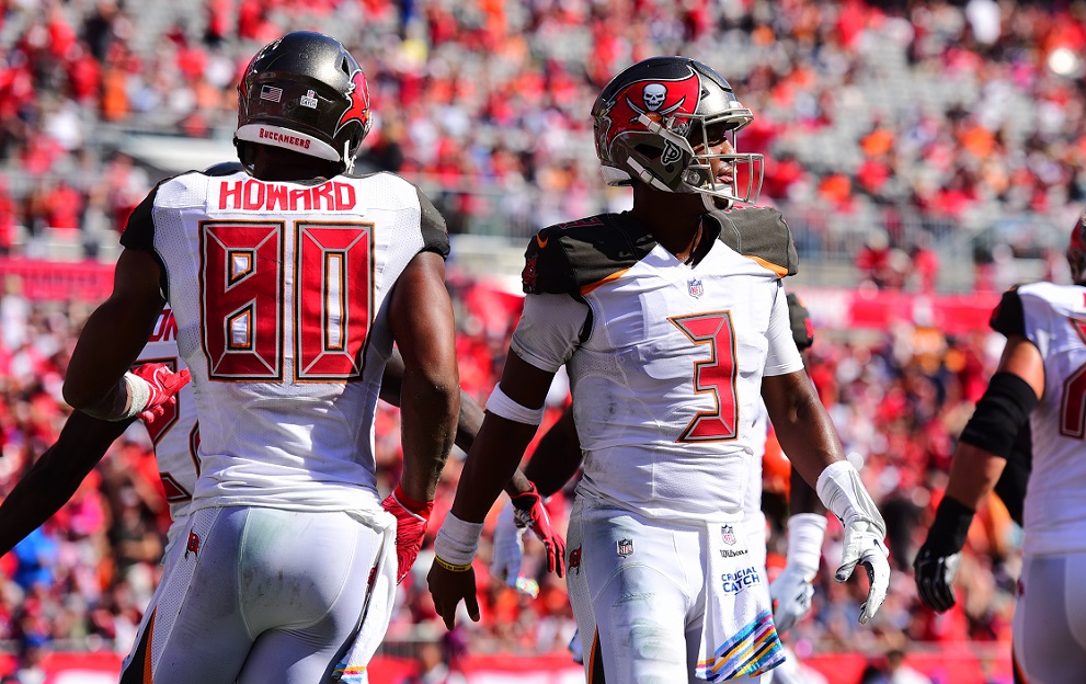 TAMPA, FL - OCTOBER 21: O.J. Howard #80 and Jameis Winston #3 of the Tampa Bay Buccaneers celebrate after a touchdown in the third quarter against the Cleveland Browns on October 21, 2018 at Raymond James Stadium in Tampa, Florida. The Buccaneers won 26-23 in overtime. (Photo by Julio Aguilar/Getty Images)