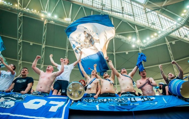 Hoffenheim's supporters celebrate after the German first division Bundesliga football match between RB Leipzig and TSG Hoffenheim in Leipzig, eastern Germany on April 21, 2018. (Photo by ROBERT MICHAEL / AFP) / RESTRICTIONS: DURING MATCH TIME: DFL RULES TO LIMIT THE ONLINE USAGE TO 15 PICTURES PER MATCH AND FORBID IMAGE SEQUENCES TO SIMULATE VIDEO. == RESTRICTED TO EDITORIAL USE == FOR FURTHER QUERIES PLEASE CONTACT DFL DIRECTLY AT + 49 69 650050 / RESTRICTIONS: DURING MATCH TIME: DFL RULES TO LIMIT THE ONLINE USAGE TO 15 PICTURES PER MATCH AND FORBID IMAGE SEQUENCES TO SIMULATE VIDEO. == RESTRICTED TO EDITORIAL USE == FOR FURTHER QUERIES PLEASE CONTACT DFL DIRECTLY AT + 49 69 650050 (Photo credit should read ROBERT MICHAEL/AFP/Getty Images)