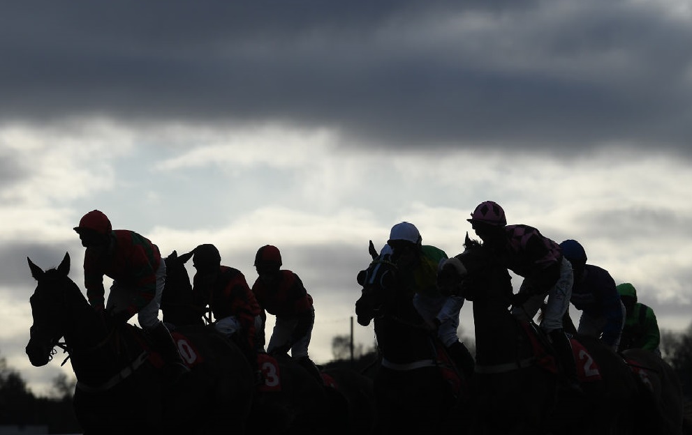 ESHER, ENGLAND - DECEMBER 06: Runners set off for the start of the Simon Jennings Memorial Novices' Limited Handicap Chase at Sandown Park on December 06, 2019 in Esher, England. (Photo by Alex Davidson/Getty Images)