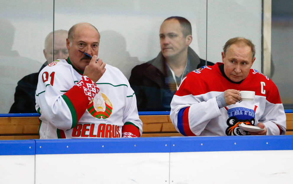 Russian President Vladimir Putin (R) and Belarusian President Alexander Lukashenko take part in an ice hockey match at Rosa Khutor outside the Black Sea resort of Sochi, on February 7, 2020, as part of Lukashenko's visit to Russia. (Photo by Alexander Zemlianichenko / POOL / AFP) (Photo by ALEXANDER ZEMLIANICHENKO/POOL/AFP via Getty Images)