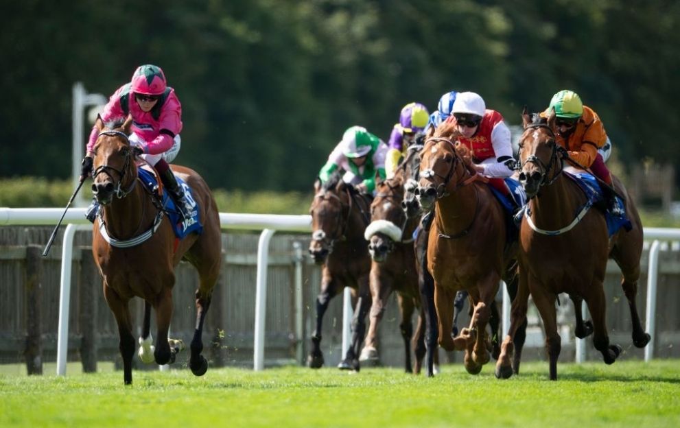 Jockey Cieren Fallon (L) rides Oxted to victory in the July Cup at Newmarket Racecourse ahead of Frankie Dettori on Irish raider Sceptical with favourite Golden Horde third in Suffolk on July 11, 2020