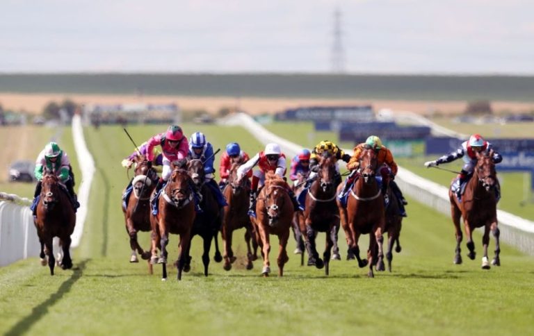 Jockey Cieren Fallon rides Oxted to victory in the July Cup at Newmarket Racecourse ahead of Frankie Dettori on Irish raider Sceptical with favourite Golden Horde third in Suffolk on July 11, 2020