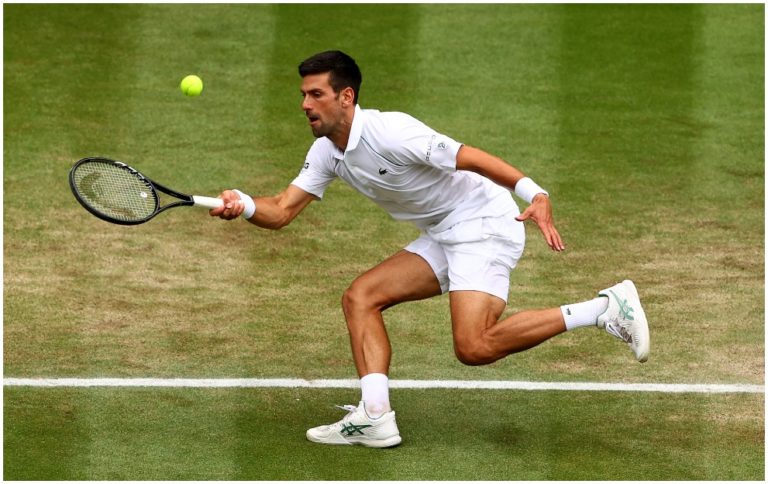 Novak Djokovic hits a shot at Wimbledon