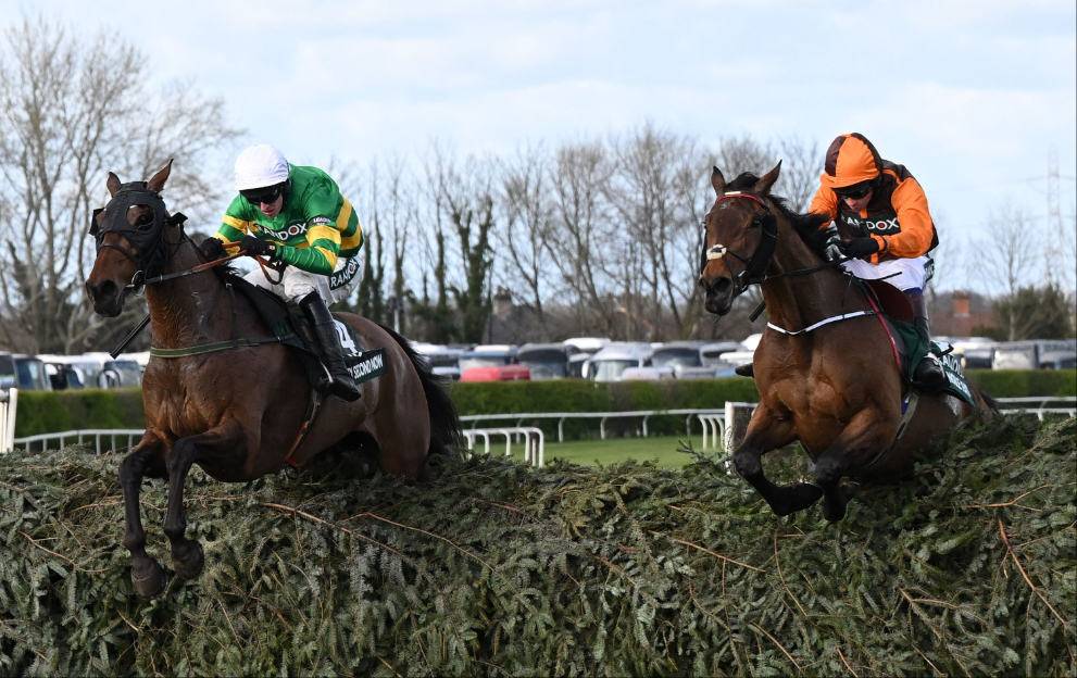 Any Second Now and Noble Yeats jump a fence in the Grand National