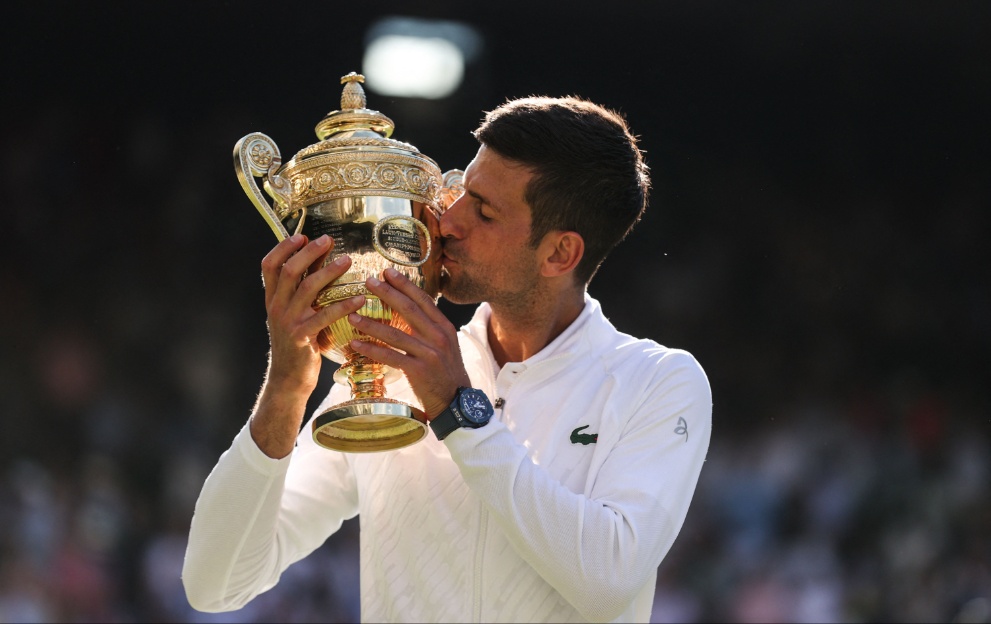 Novak Djokovic with the Wimbledon trophy