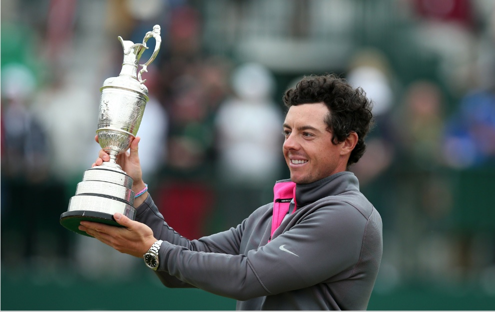 Rory McIlroy holds the Claret Jug