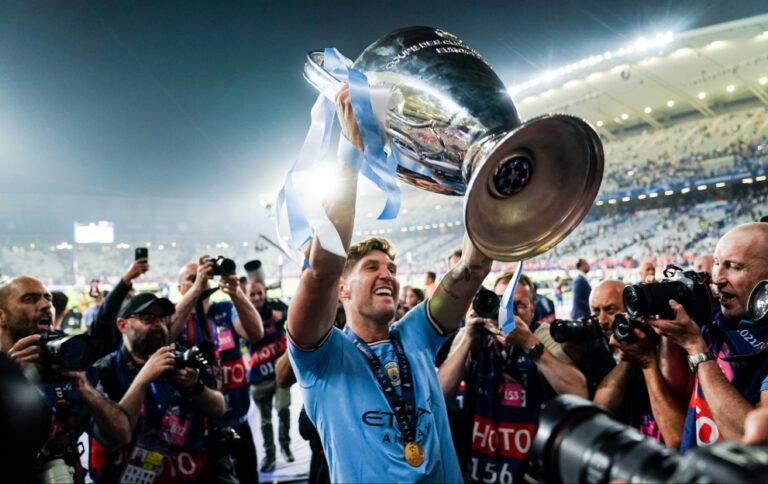 John Stones lifts the Champions League trophy